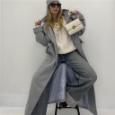 maglione con apertura regolabile sul davanti laccio